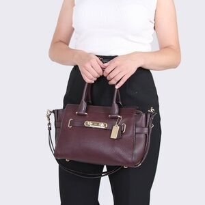 Coach Swagger 20" Pebble Leather Oxblood.